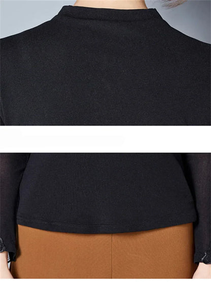 TINATII | Spitzenbluse mit Turtleneck aus Baumwolle